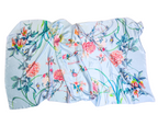 A light blue silk scarf with a vibrant watercolor floral print featuring pink peonies, green leaves, and small birds, laid flat on a white background.