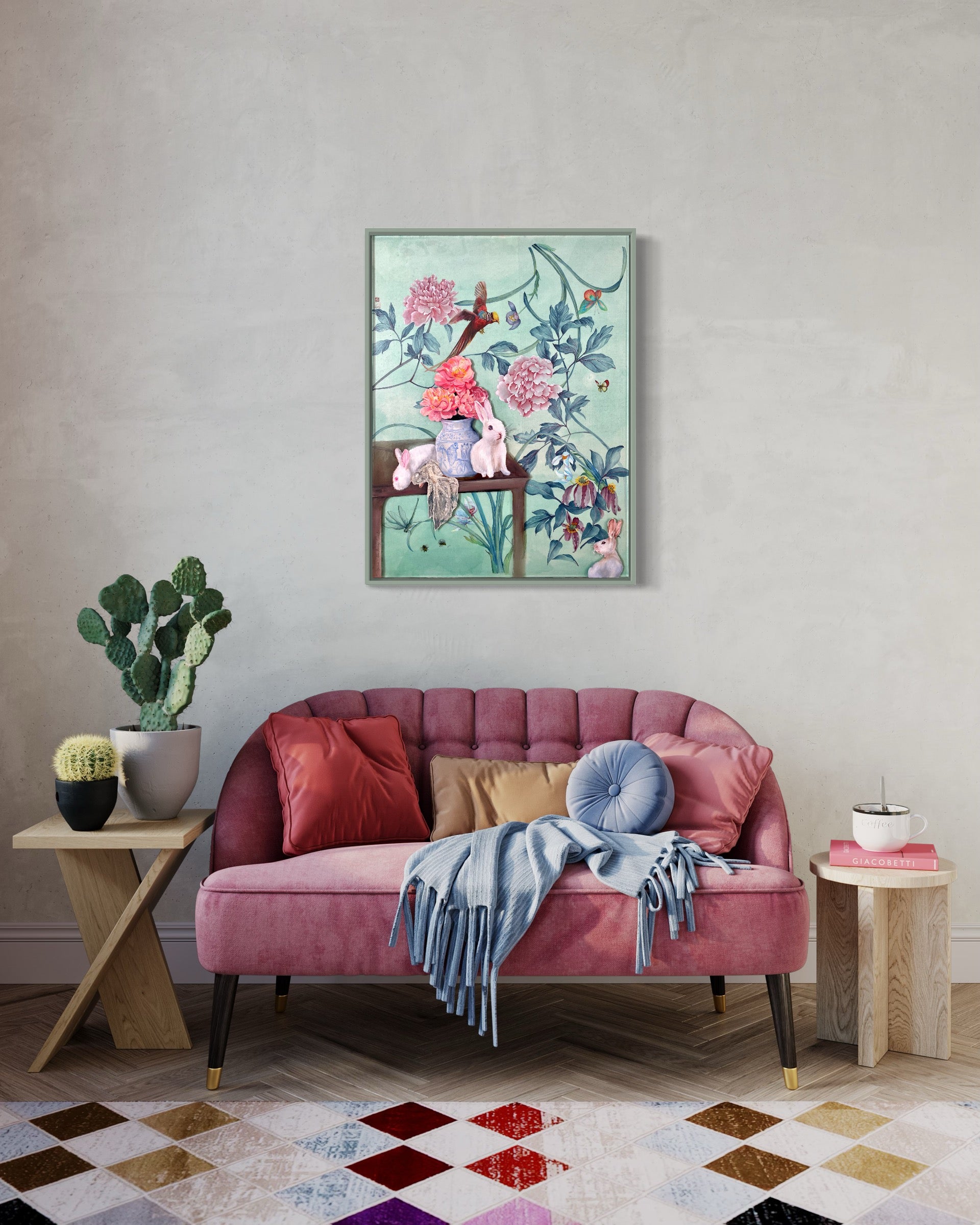 A framed art print featuring a green background with peonies and rabbits, placed on a pink sofa in a living room setting.